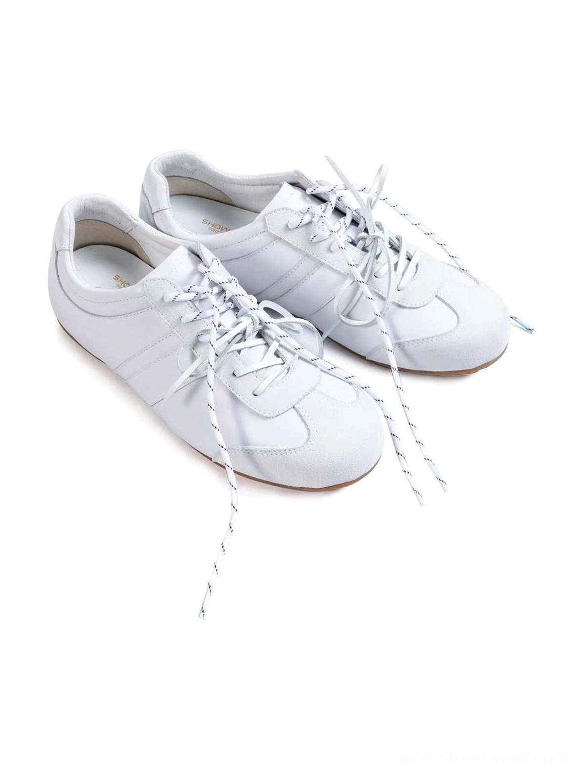 Pair of white gloss-finish leather low-profile retro trainers with flat laces and subtle side detailing