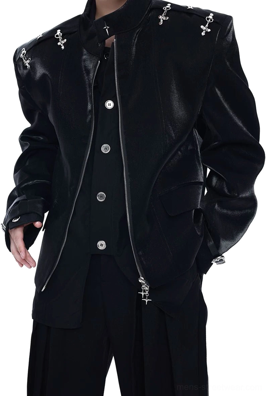 Detailed front view of a glossy black gothic punk blazer with padded shoulders, multiple silver cross accents, zipper, and button placket