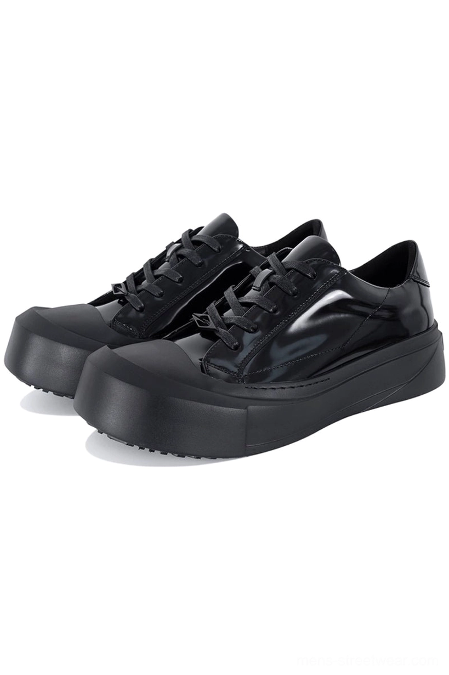 Glossy patent black leather toe cap platform sneakers with square toe, black laces, and thick matte platform sole