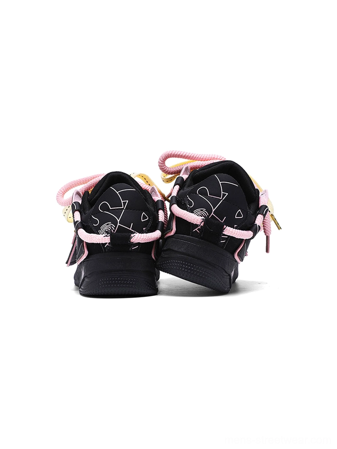 Rear view of black graphic chunky sneakers with pink heel trim, decorative lines, and contrast streetwear laces