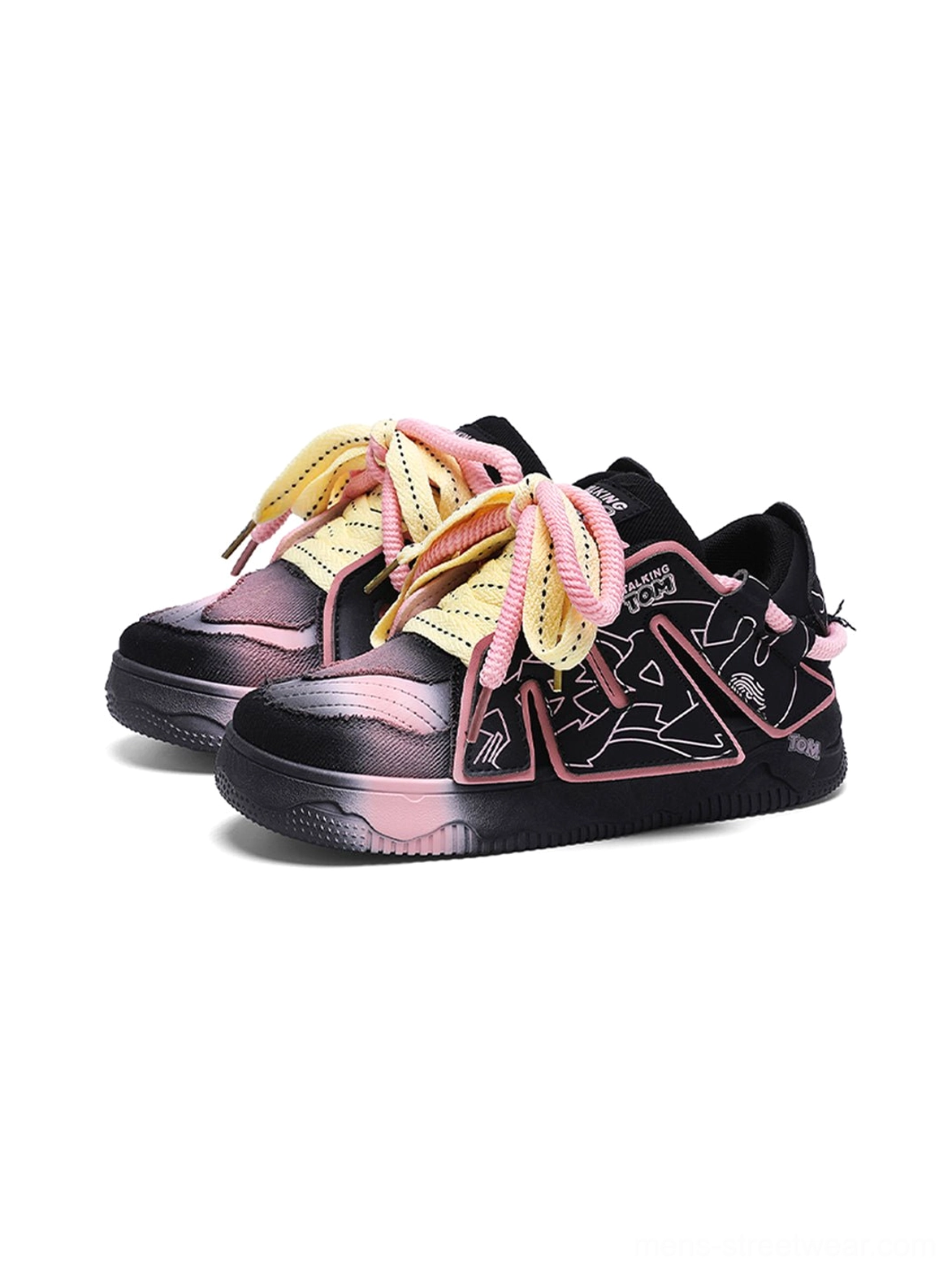 Three-quarter view of black pink graphic chunky low-top sneakers with abstract line graphics and contrast laces