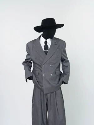 Graphite grey pinstripe oversized double-breasted streetwear blazer shown front view with matching tailored wide-leg trousers