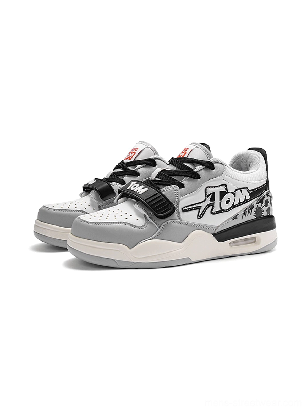 Gray and black colorblock basketball-inspired sneakers with black laces, adjustable strap, graphic side detailing, and chunky outsole