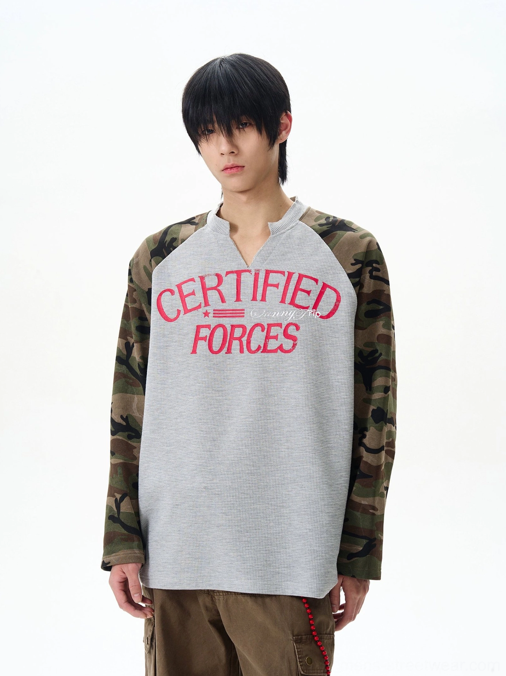 Close front view of gray certified forces camo sleeve streetwear henley shirt