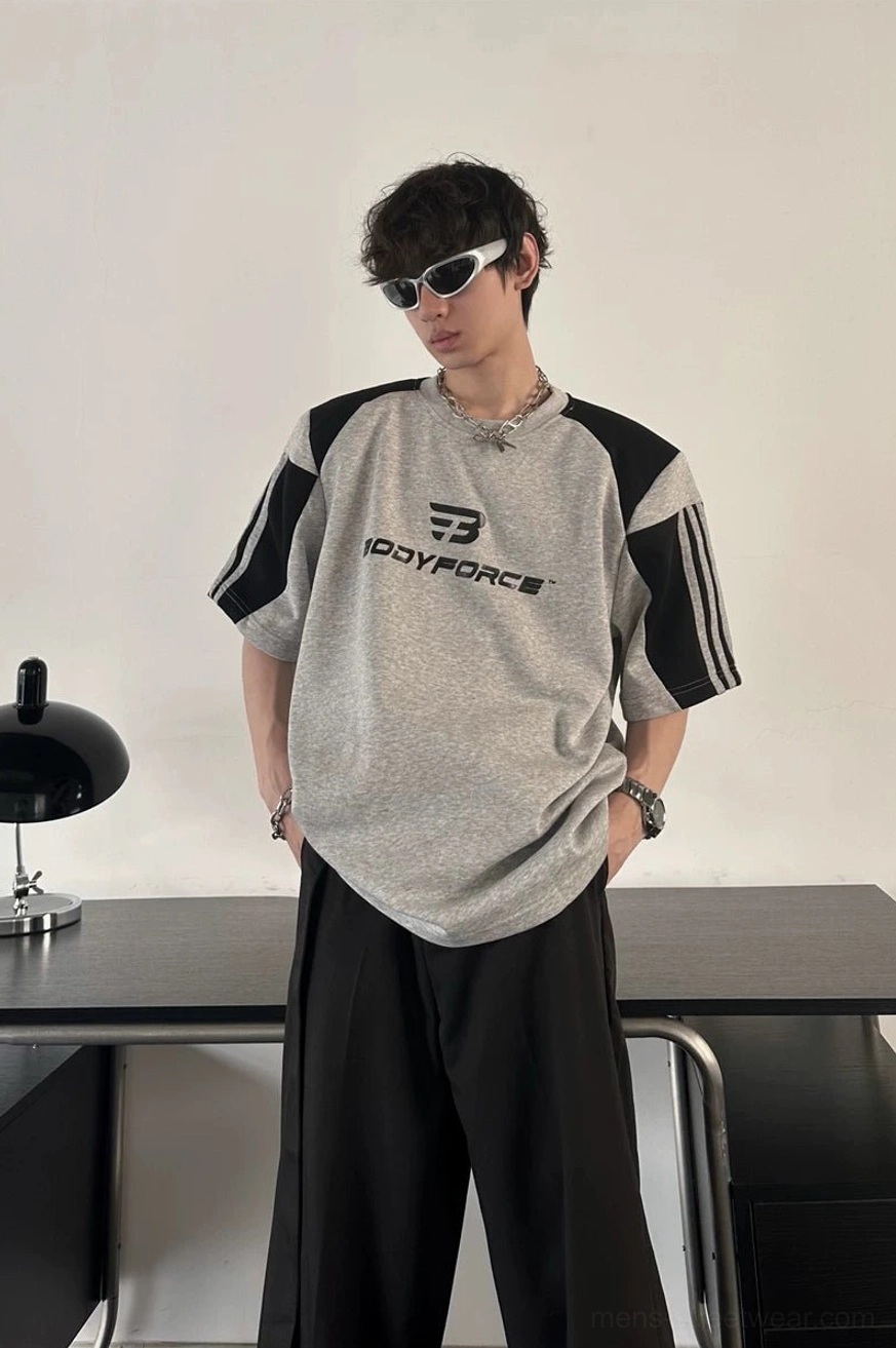 Gray colorblock sport tee with relaxed boxy silhouette and modern athletic streetwear details