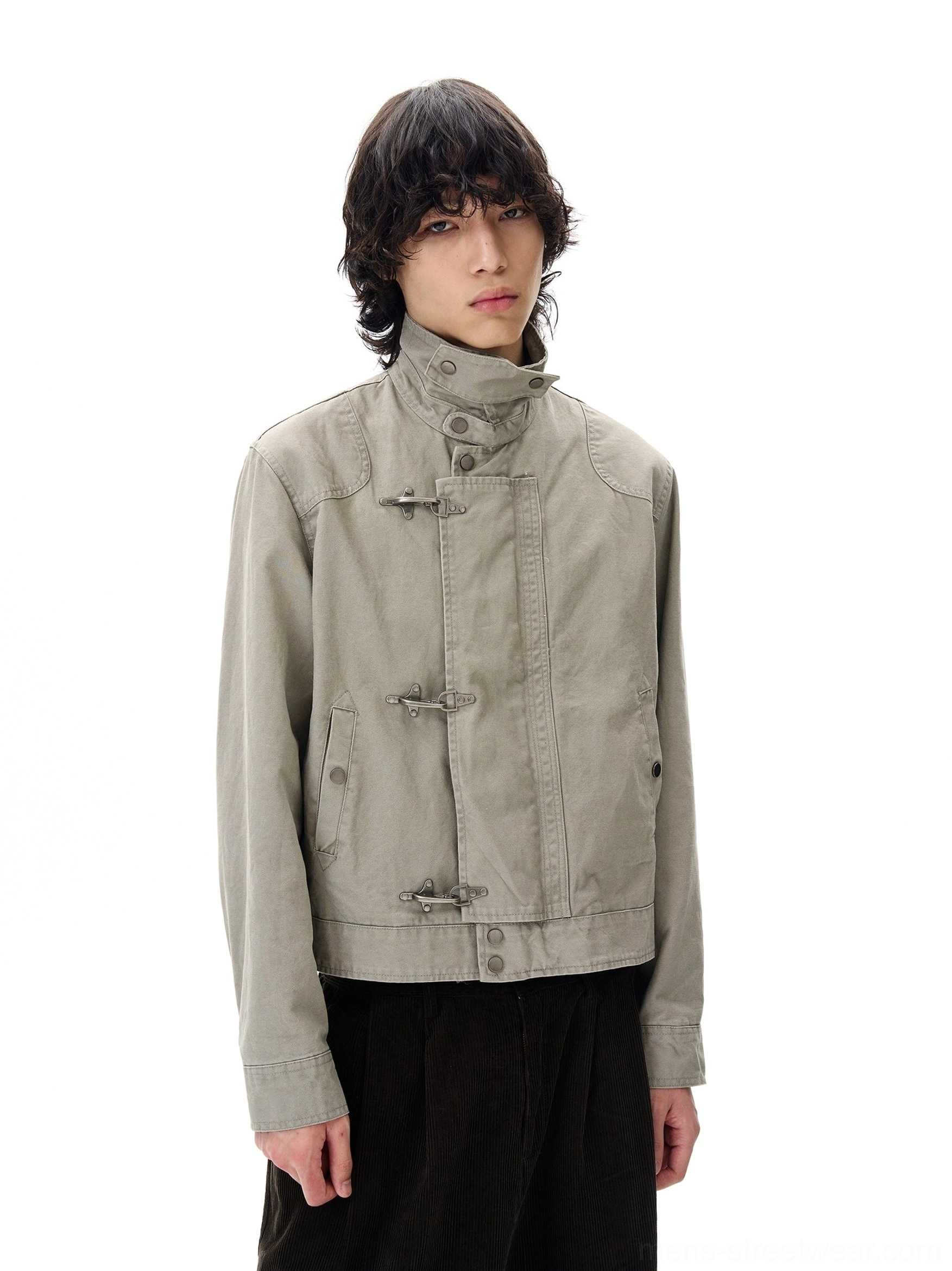 Gray cropped cotton utility jacket with metal toggle closures and adjustable waist belt front studio view