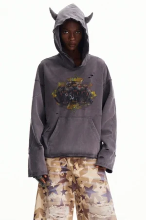 Front full-body view of a faded gray distressed graphic hoodie with devil horn hood details, kangaroo pocket, frayed cuffs, and oversized Korean streetwear styling