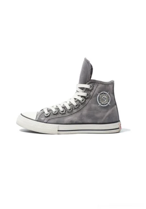 Right side three-quarter view of a gray distressed high-top canvas sneaker with washed denim texture, white laces, rubber sole, and ankle badge