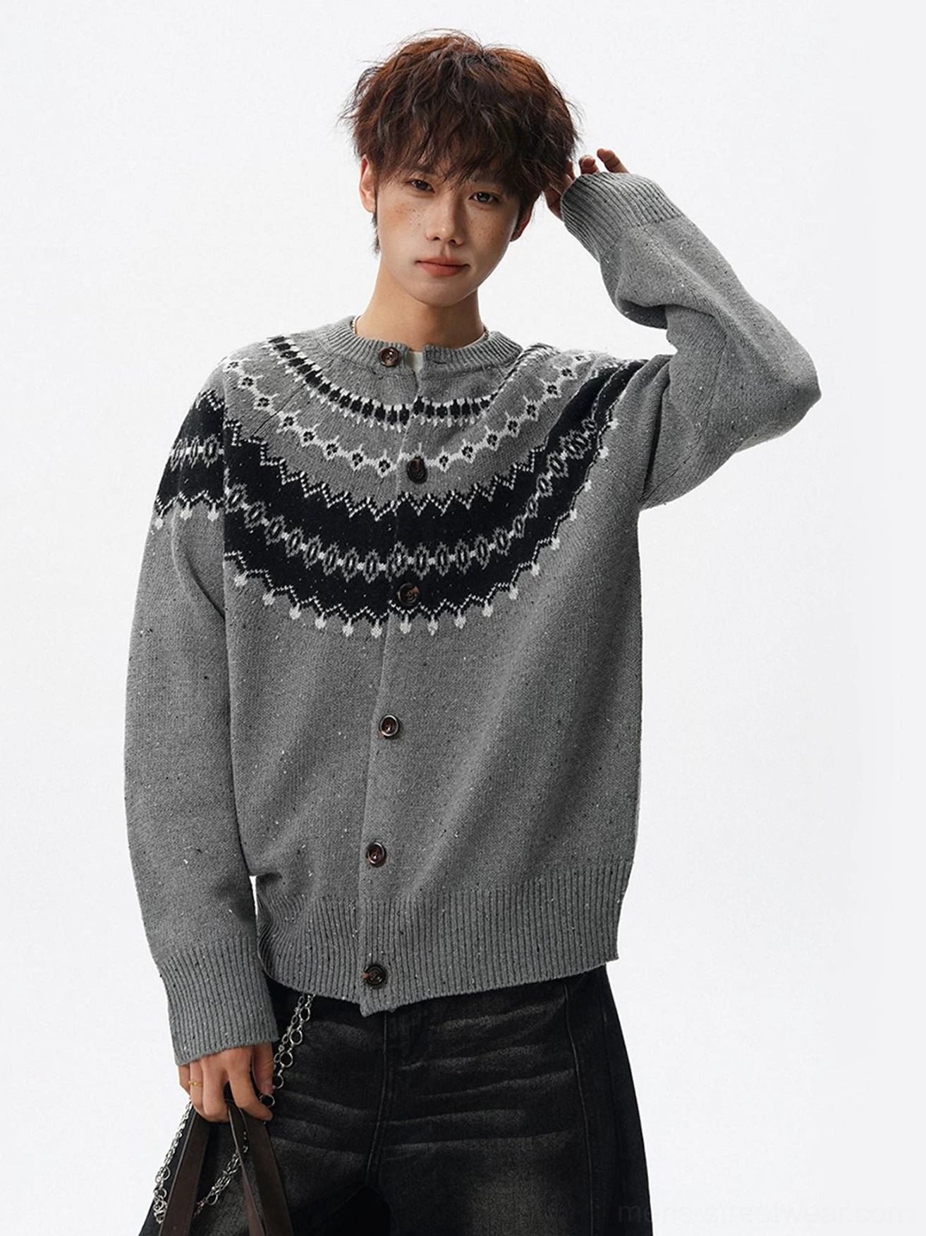 Men's gray Fair Isle button front cardigan with relaxed fit shown from a three-quarter front studio angle