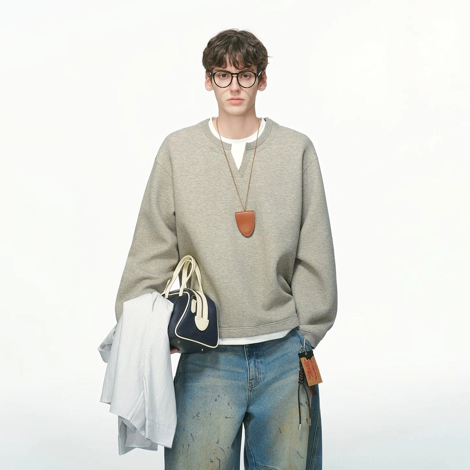 Heather gray fleece-lined and thickened men's layered crew neck sweatshirt with relaxed oversized fit and faux layered hem
