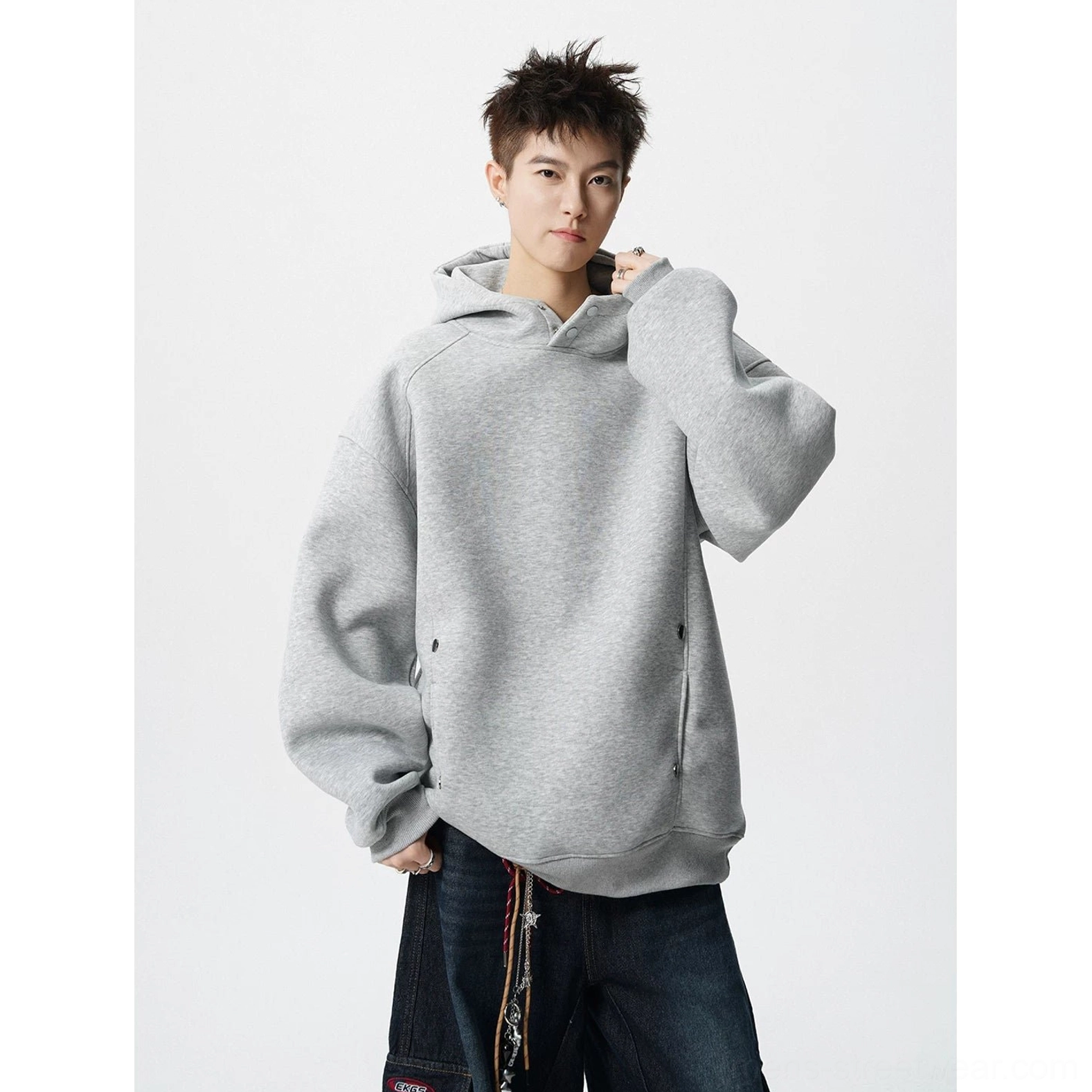 Light gray fleece lined oversized hoodie with drop shoulders attached hood and relaxed baggy silhouette