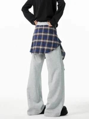 Gray hybrid wide-leg jogger pants back view featuring a red and blue plaid flannel shirt overlay at the elastic waist