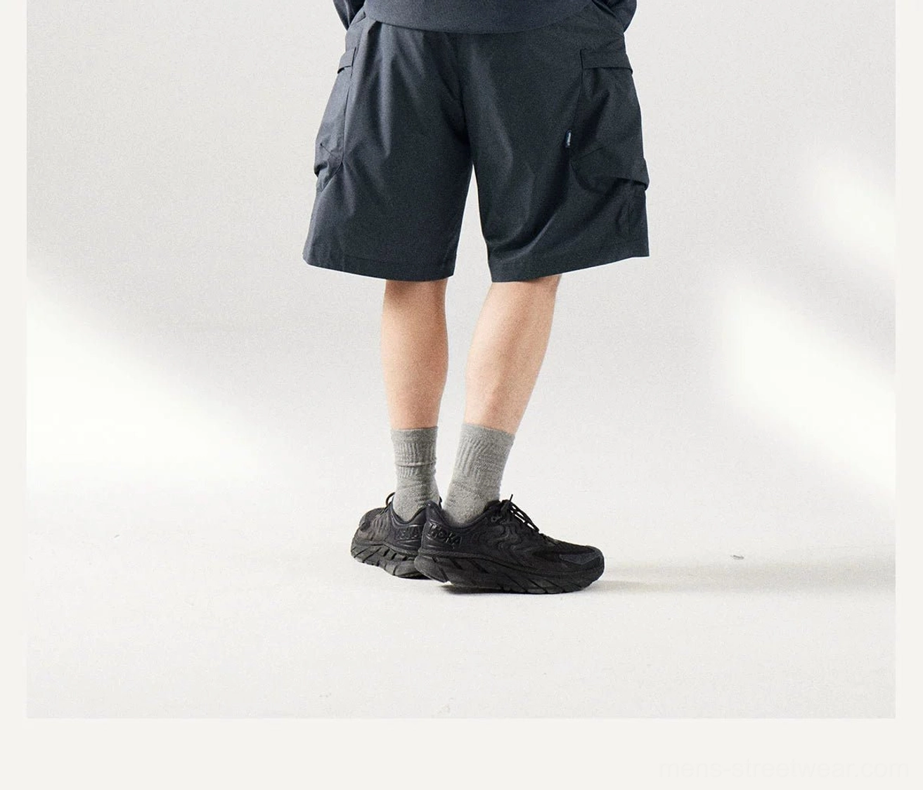 Gray khaki men's breathable cargo shorts with utility pockets, above-knee length, and an easy relaxed fit for summer outfits