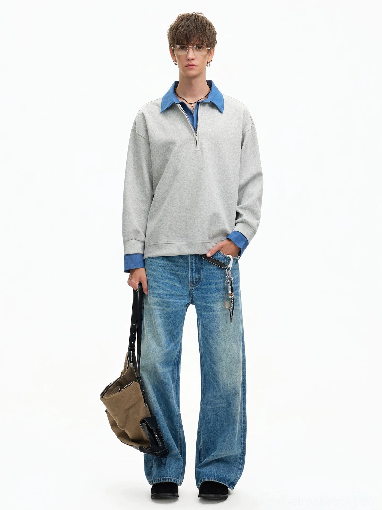 Full front view of heather gray Korean streetwear sweatshirt with layered blue collar worn with jeans and shoulder bag