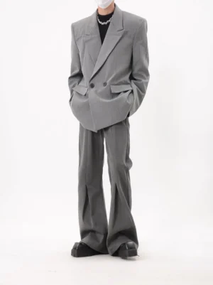Gray longline pinstripe double-breasted blazer with relaxed oversized tailoring and flap pockets styled in a Korean fashion look