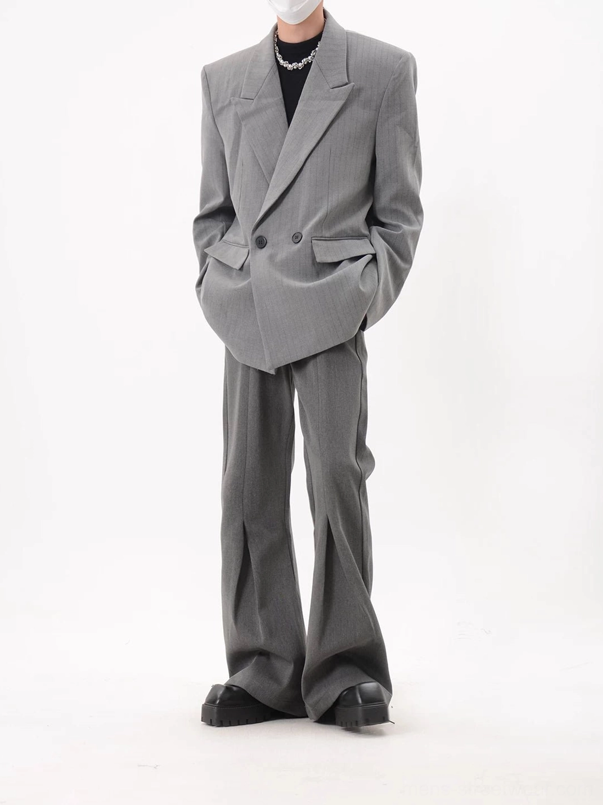 Gray longline pinstripe double-breasted blazer with relaxed oversized tailoring and flap pockets styled in a Korean fashion look