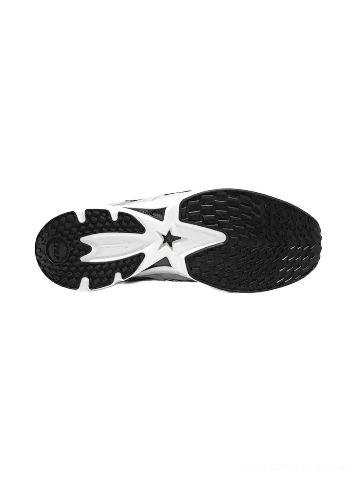 Outsole view of gray platform running sneakers showing black multi-directional rubber tread, white midsole, and star-shaped sole accent