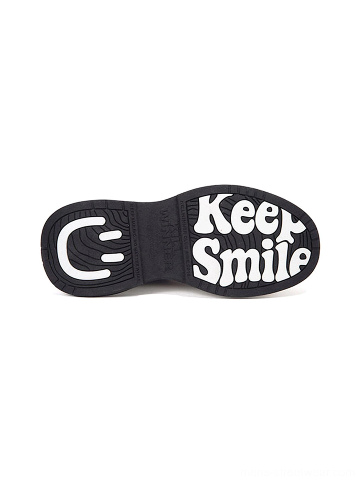Black rubber anti-slip outsole of gray platform sneakers with textured tread, Keep Smile slogan, and smiley face graphic