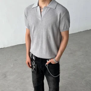 Heather gray ribbed knit polo shirt with relaxed short sleeves and open collar styled with black washed jeans for Korean streetwear