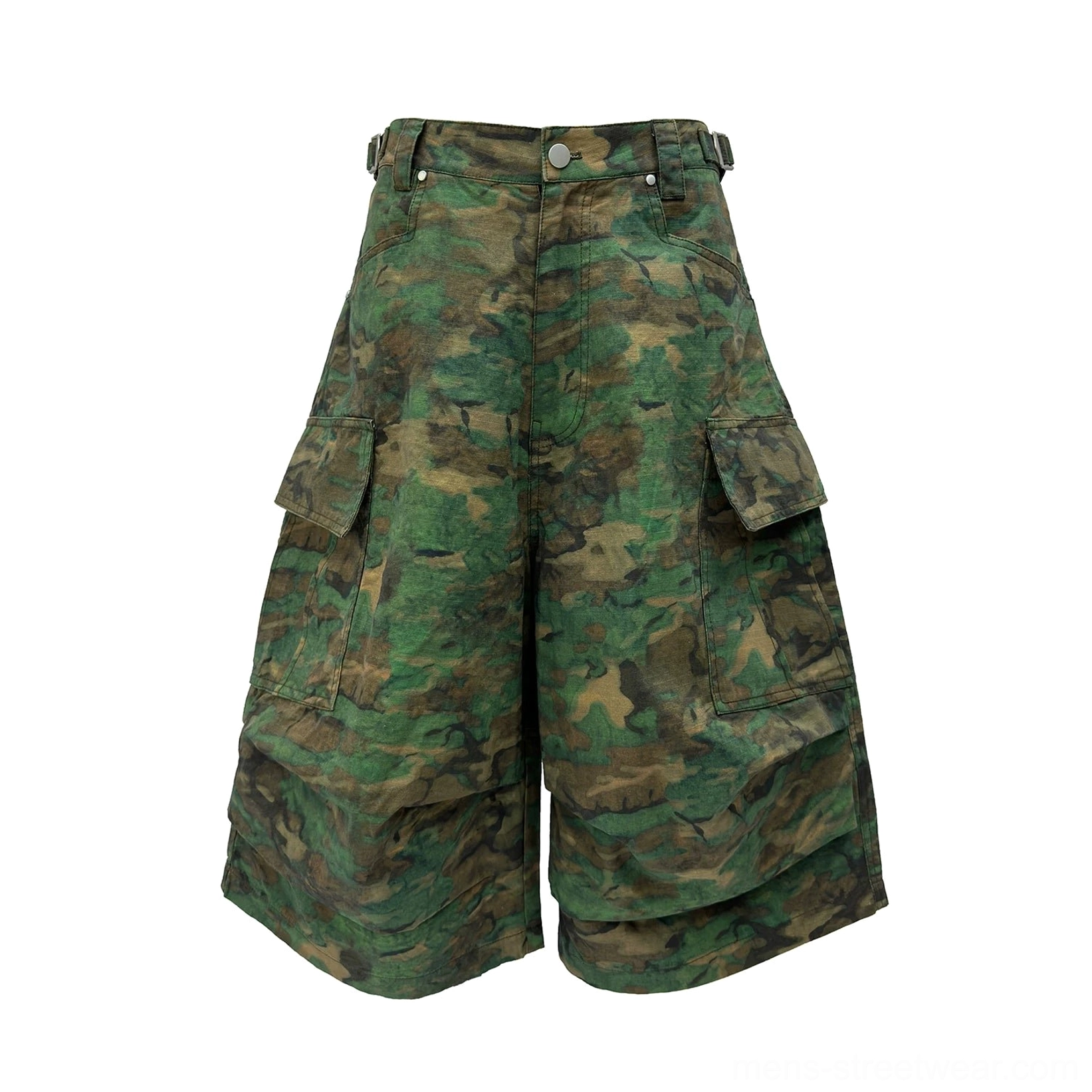 Standalone front view of green camouflage tiered cargo shorts with oversized utility pockets, wide-leg fit, and detailed streetwear construction