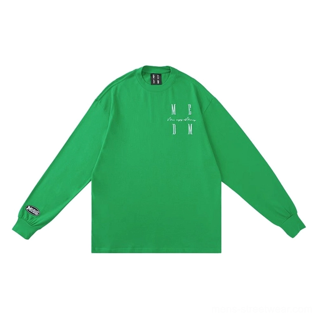 Green oversized MCDM graphic long sleeve T-shirt in relaxed Korean streetwear style with full-length sleeves