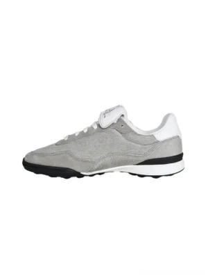 Rear left view of grey fur-lined platform sneakers with fuzzy upper, white leather heel tab, layered white midsole, and black rubber outsole