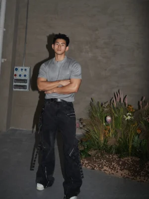Grey single-button Henley knit T-shirt in a modern Korean streetwear outfit with black cargo pants