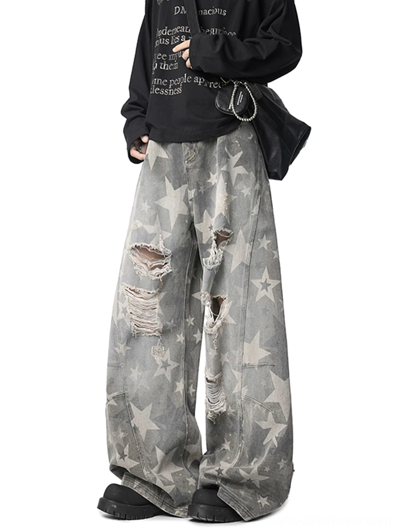 Grey star print ripped wide leg jeans side view showing frayed distressed denim and loose fit