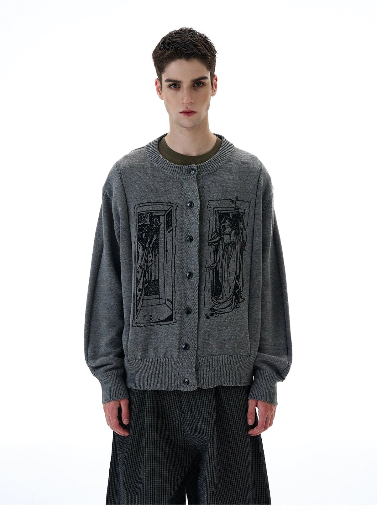 Close front view of grey tarot graphic knit cardigan with button placket tarot window artwork and ribbed hem