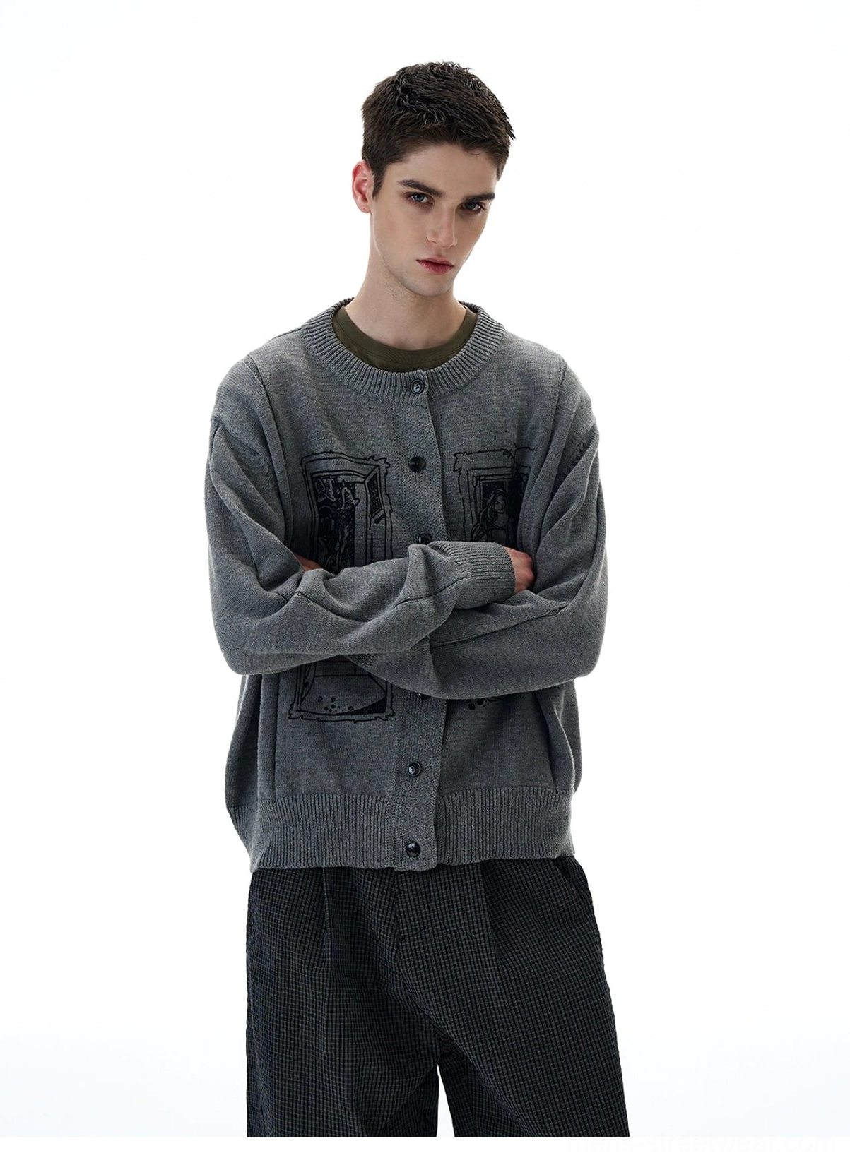 Grey tarot window graphic knit cardigan worn buttoned in a relaxed Korean streetwear styling with wide pants