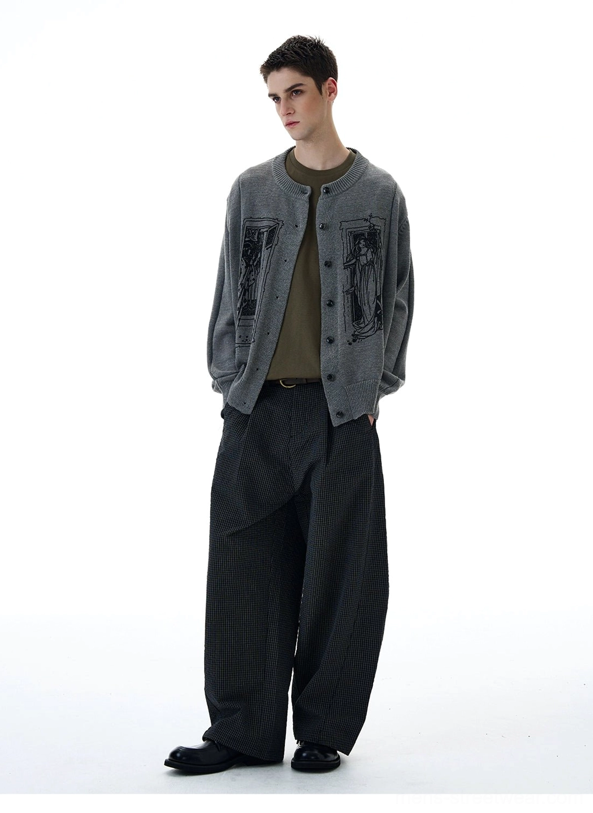 Side front view of grey tarot window graphic cardigan showing relaxed silhouette ribbed cuff and ribbed hem