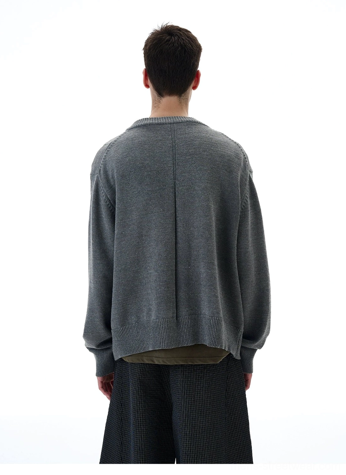 Back view of grey tarot window graphic knit cardigan showing solid heather grey knit back and ribbed crew neckline