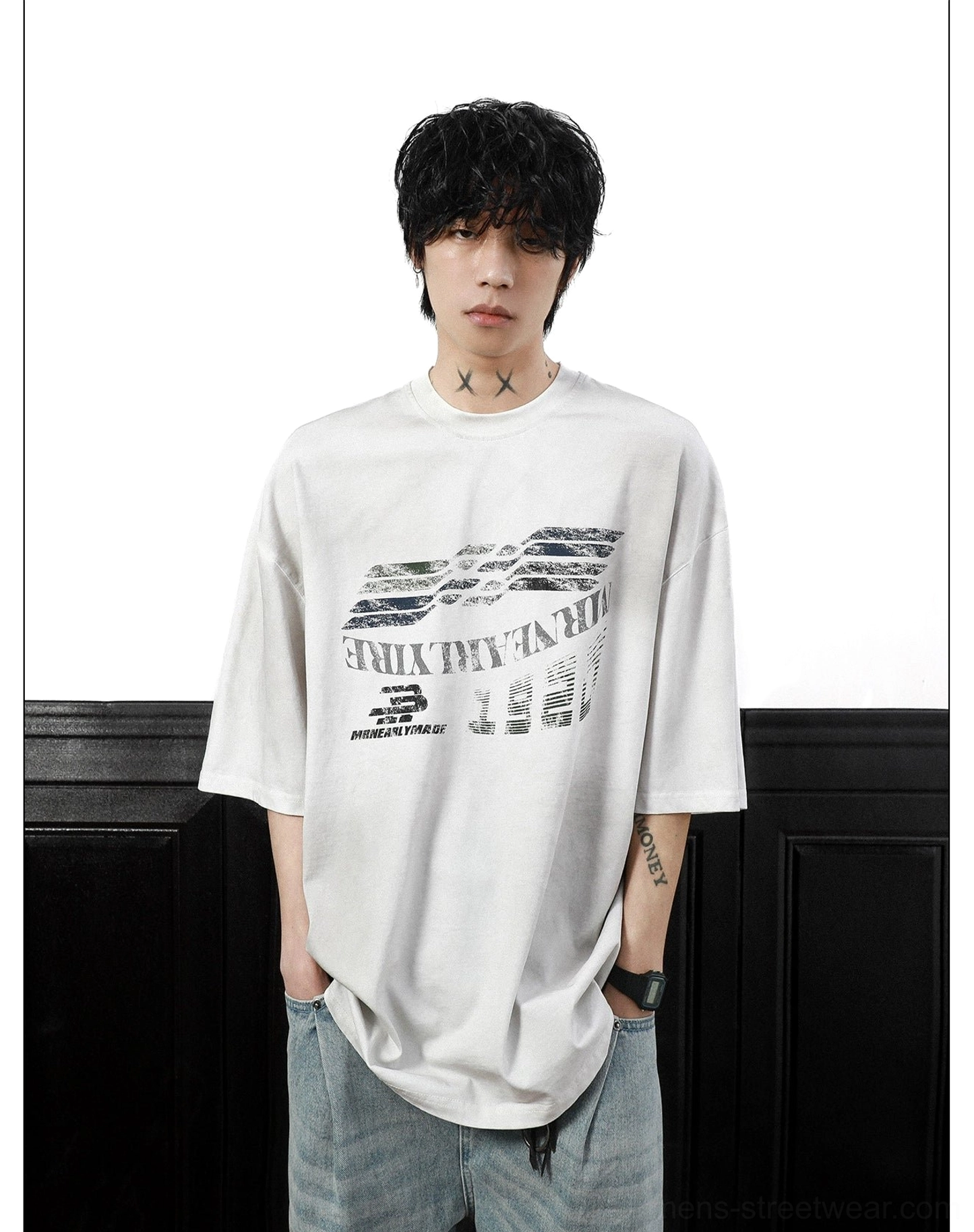 Close front styling view of the Gridline Drift oversized graphic T-shirt with distressed motorsport artwork and dropped shoulders