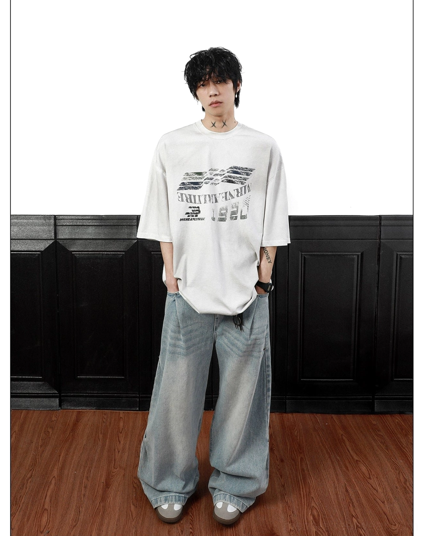 Front view of the Gridline Drift retro racing graphic T-shirt styled in an oversized streetwear silhouette with distressed chest artwork