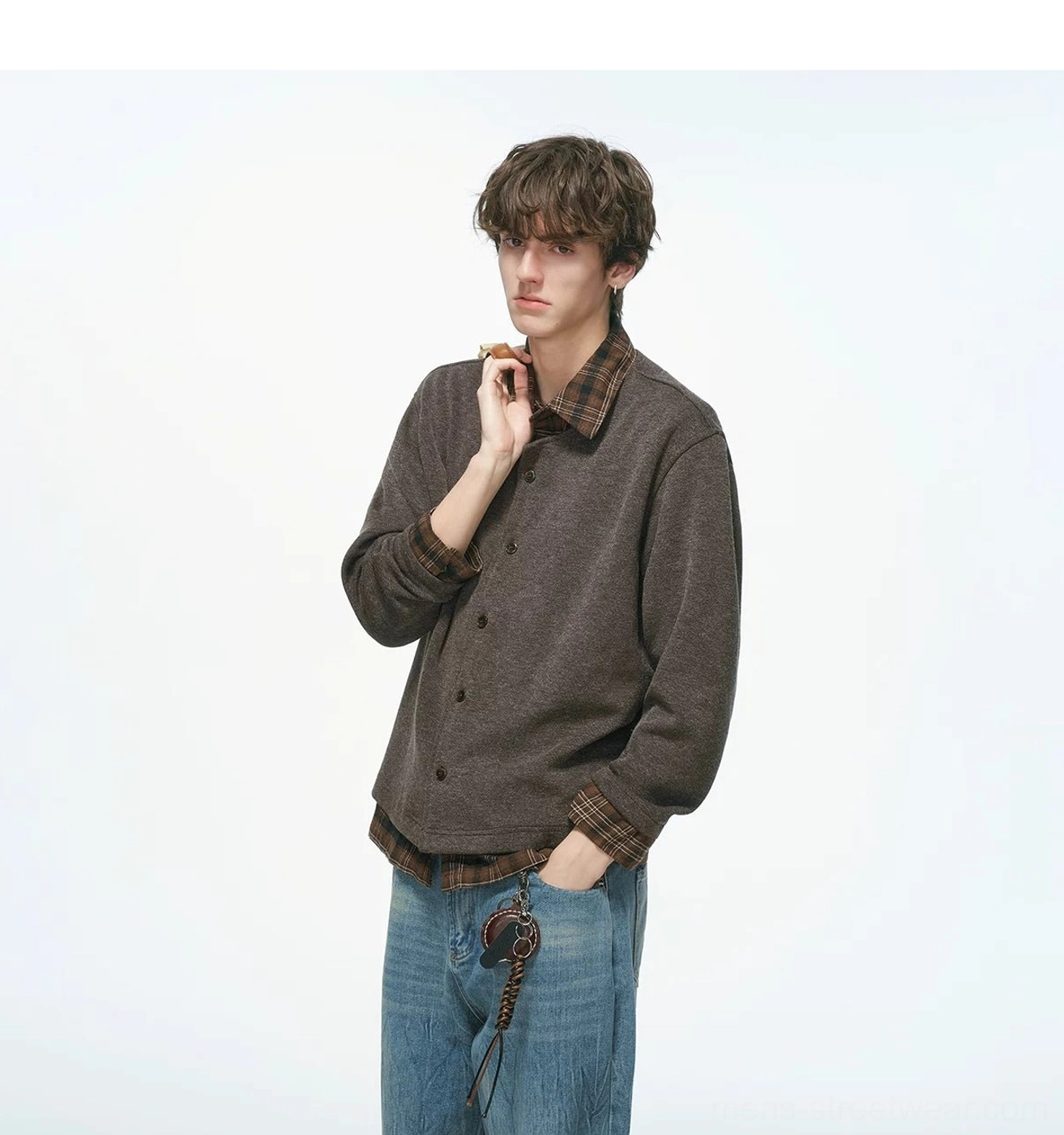 Heather brown layered knit shirt jacket with contrasting plaid collar and cuffs shown in a front three-quarter view