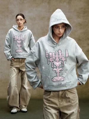 Heather gray chandelier embroidered oversized streetwear hoodie worn by two models in casual Seoul-inspired outfits