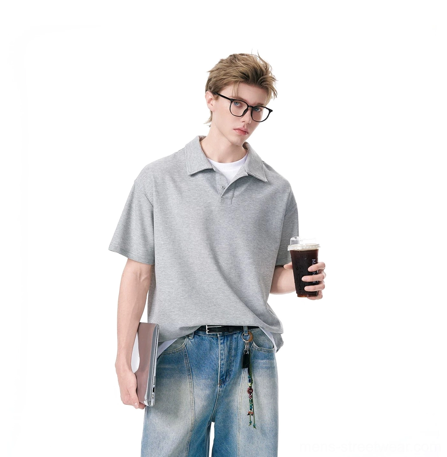 Heather gray knit polo shirt layered over a white T-shirt with laptop and iced coffee streetwear styling
