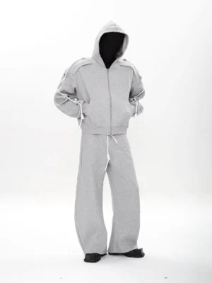 Heather gray modular zip hoodie and wide-leg sweatpants matching set shown from the front with relaxed cropped streetwear fit