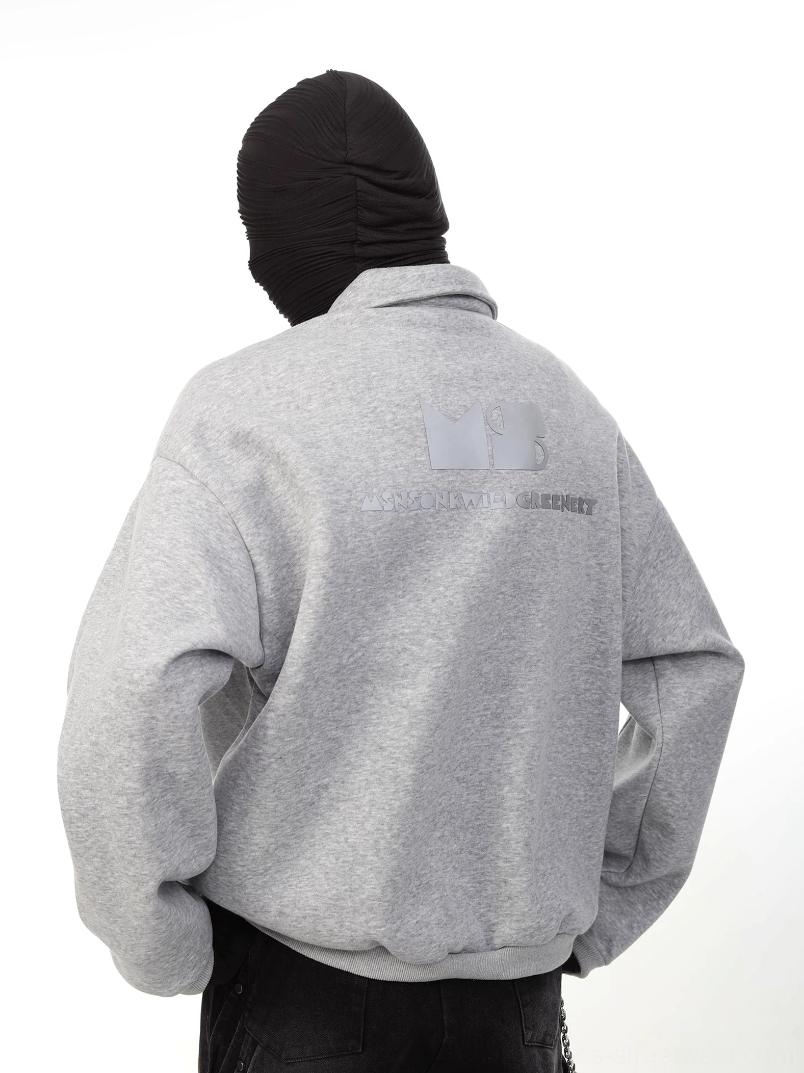 Heather gray oversized cotton sweatshirt shown from the back with tonal graphic print ribbed hem and cuffs