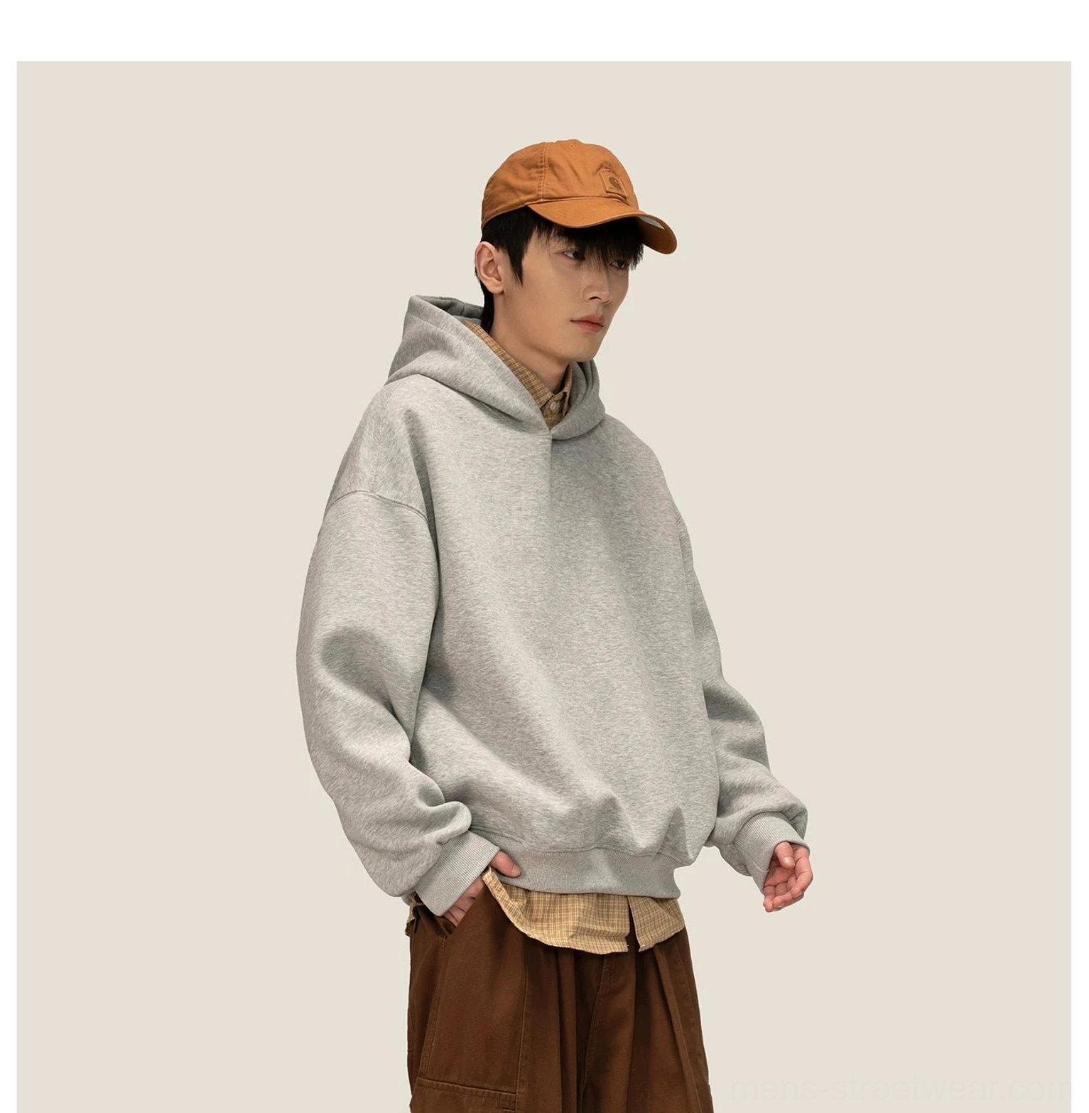 Heather gray oversized fleece hoodie layered over a shirt with relaxed Korean casual streetwear styling