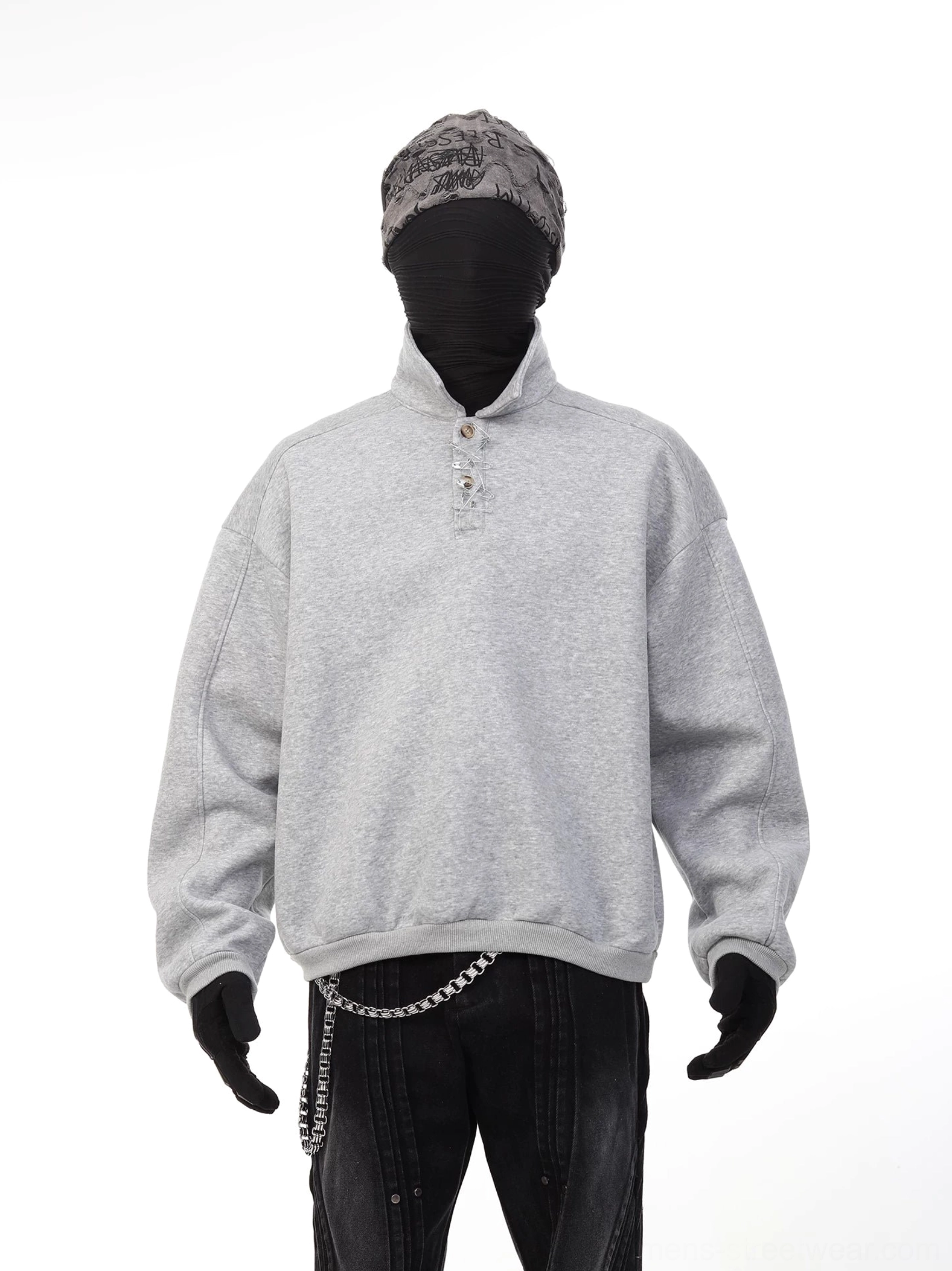 Heather gray oversized henley polo sweatshirt three quarter view with button placket ribbed cuffs and relaxed streetwear fit
