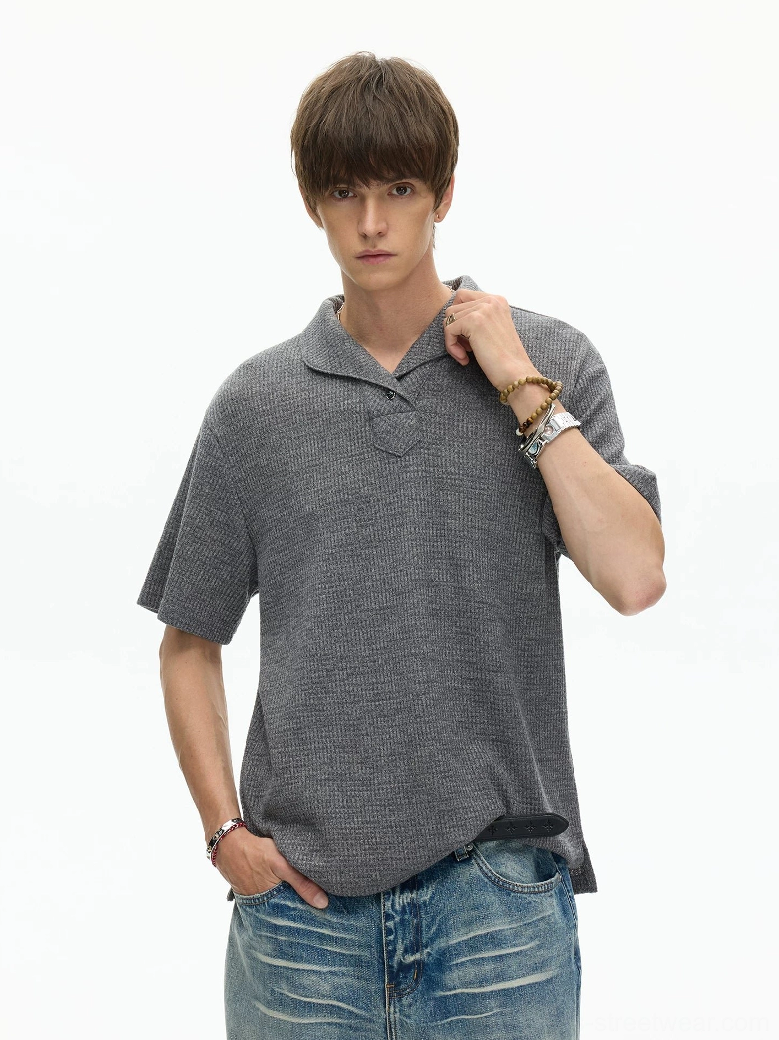 Heather gray textured shawl collar knit polo tee with relaxed fit styled with straight blue jeans and wrist accessories for Seoul-inspired streetwear