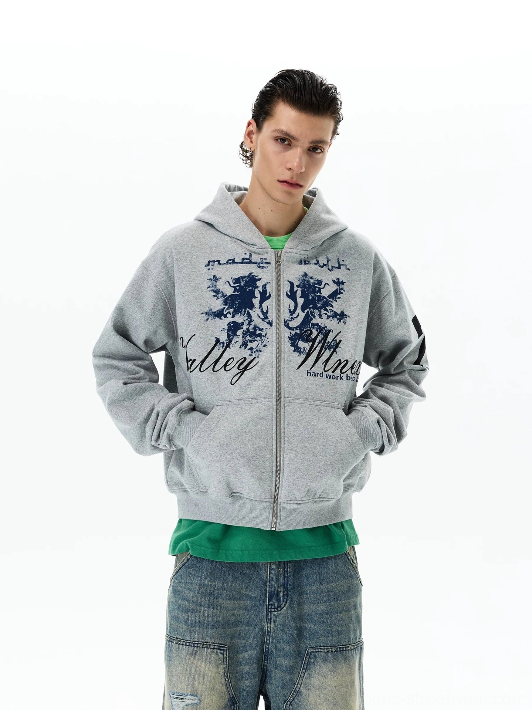 Front view of a heather grey Valley Mines style crest hoodie featuring distressed lion artwork, full zip closure, kangaroo pockets, and relaxed fit