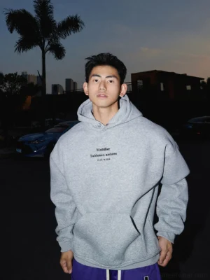 Heather grey minimal text graphic hoodie with soft cotton blend texture and relaxed Korean streetwear silhouette