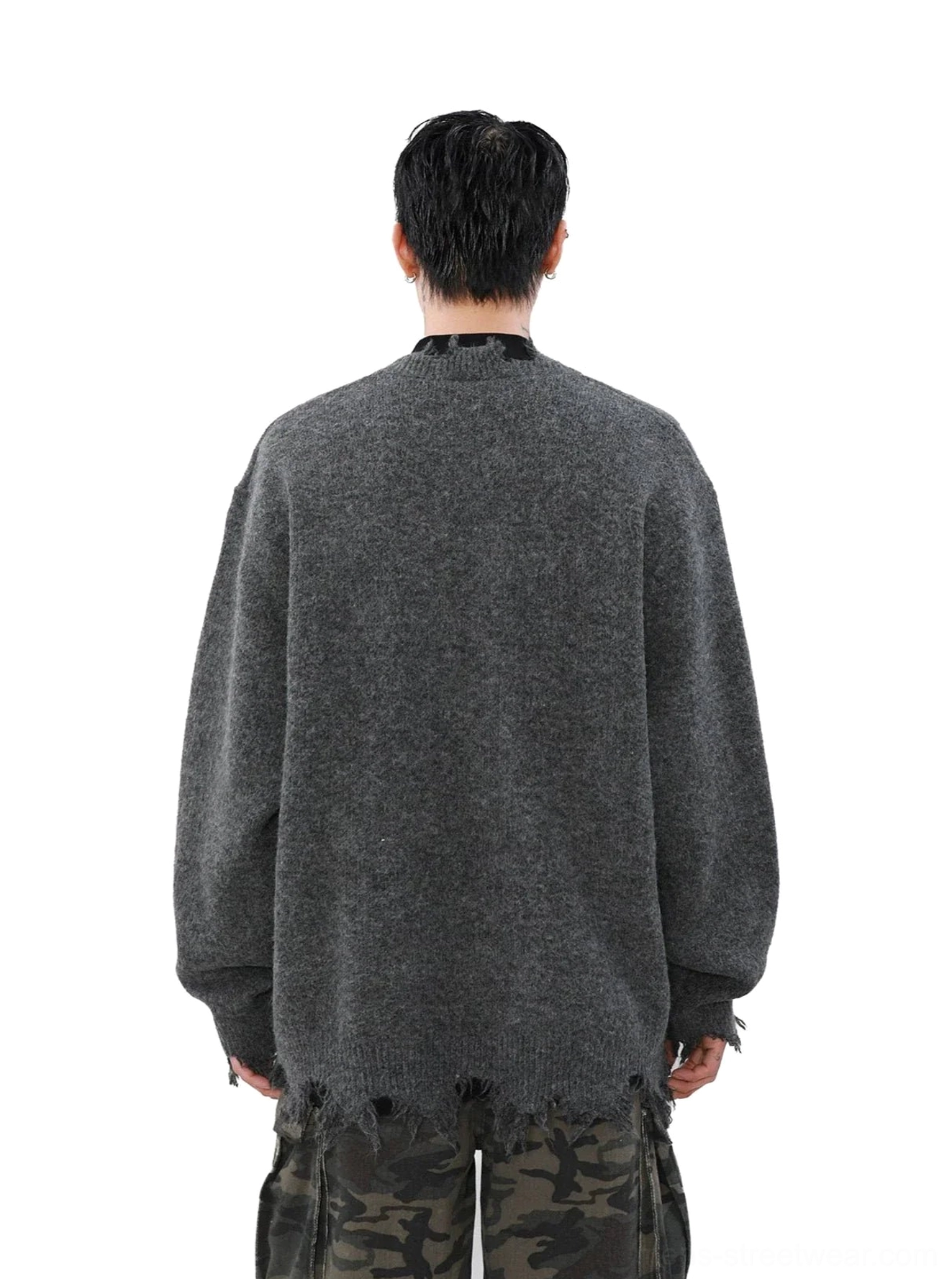 Back view of heather grey oversized distressed sweater with seamless knit design and frayed back hem