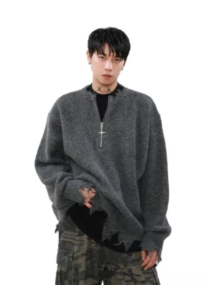 Heather grey oversized half-zip distressed sweater with frayed hem and thick knit texture in relaxed streetwear styling