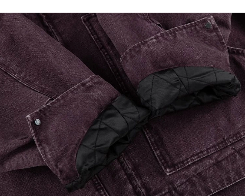 Heavy cotton canvas work jacket with soft quilted lining and relaxed proportions for cool-weather urban layering