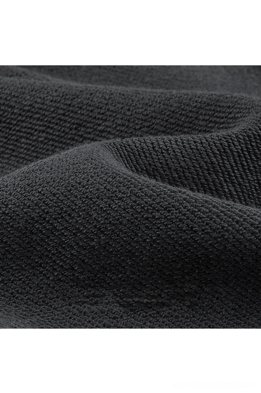 Close-up view of heavyweight soft cotton French terry fabric texture from an oversized polo sweatshirt