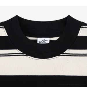 Close-up of the ribbed crew neck and neat stitching on a heavyweight striped oversized streetwear T-shirt