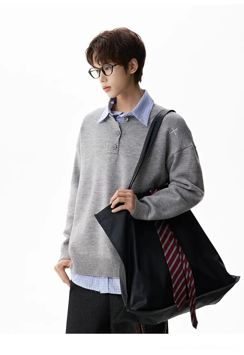 Henley knit sweater detail view highlighting the ribbed collar, short button placket, and oversized Korean fashion fit